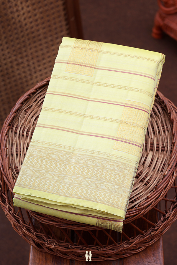 Kanchipuram Silk Saree In Light Yellow With Stripes Design
