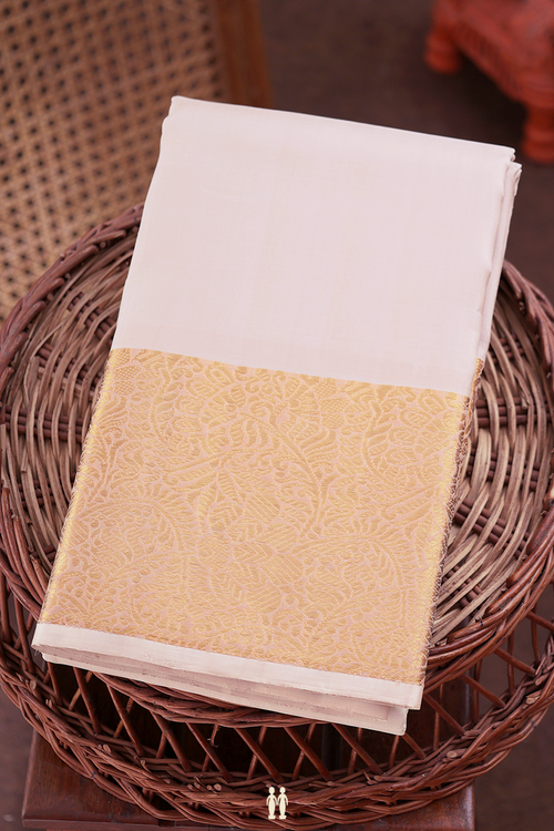 Kanchipuram Silk Saree In Cream Color With Zari Border