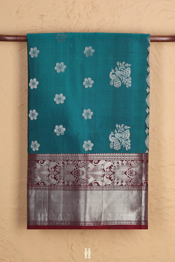 Soft Silk Saree In Teal Blue With Peacock Motifs