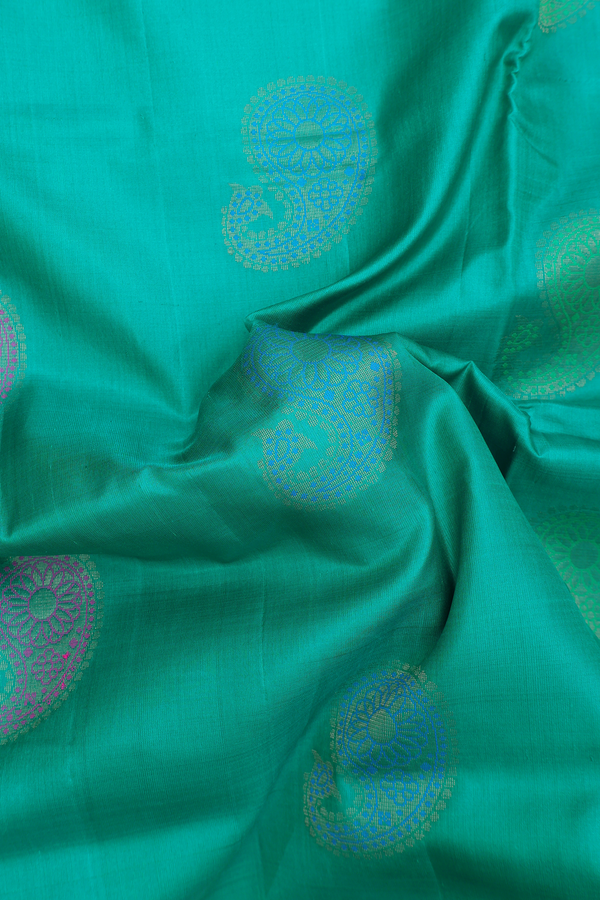 Soft Silk Saree In Green With Paisley Motifs