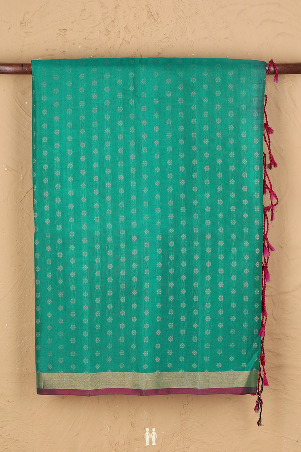 Soft Silk Saree In Green With Floral Buttas