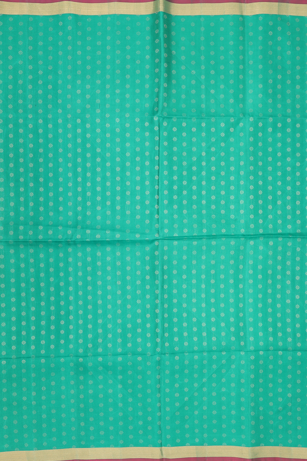 Soft Silk Saree In Green With Floral Buttas