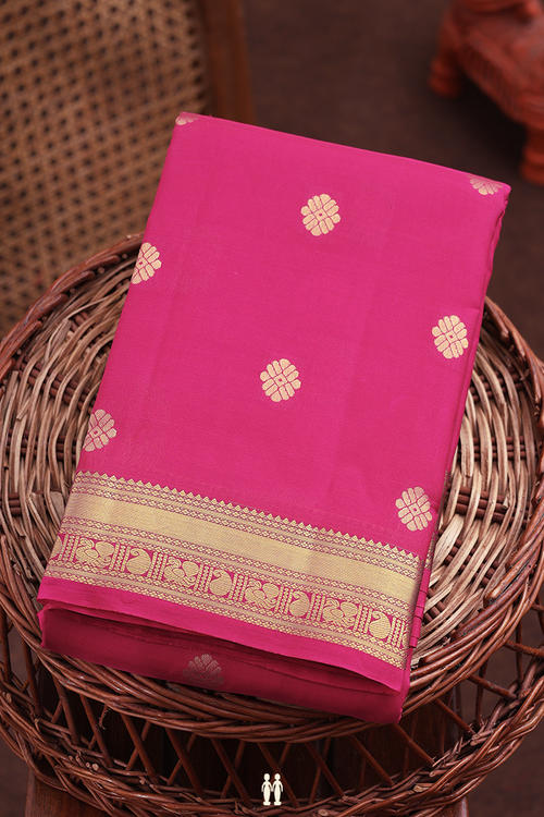 Kanchipuram Silk Saree In Rani Pink With Floral Buttas