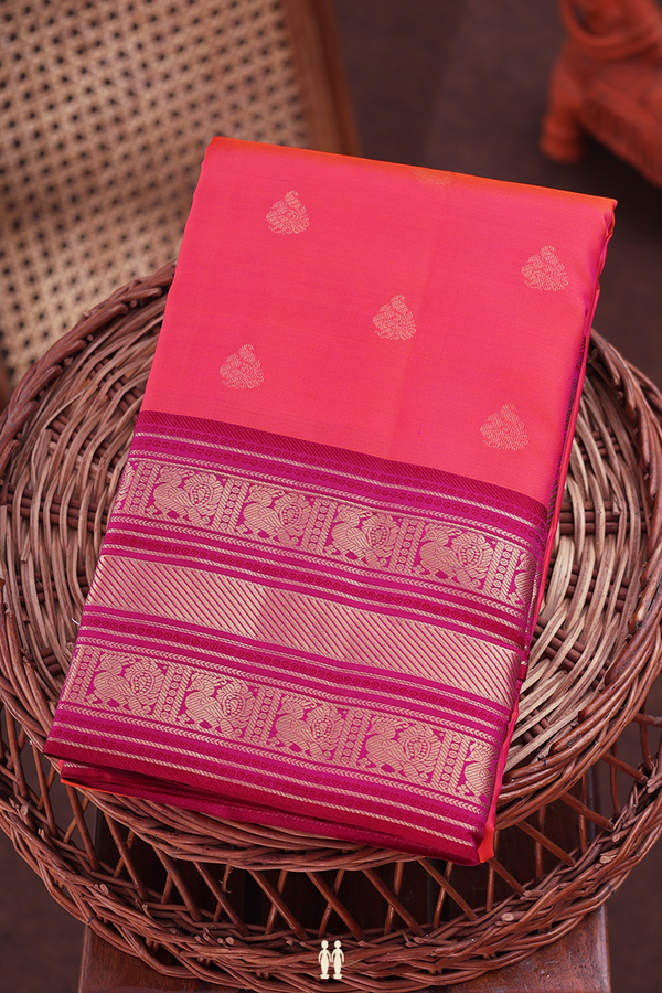 Kanchipuram Silk Saree In Coral Pink With Peacock Buttas