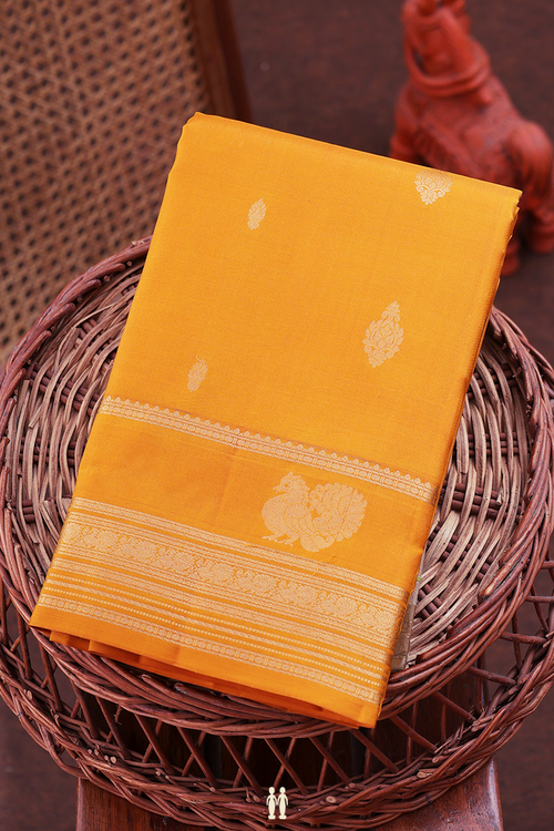 Kanchipuram Silk Saree In Yellow With Zari Buttas