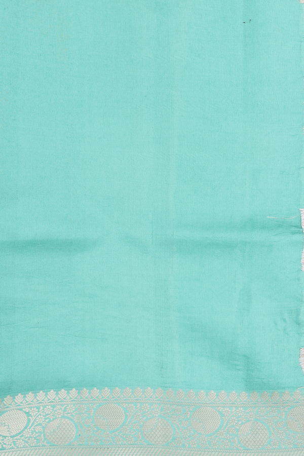 Raw Silk Saree In Tiffany Blue With Floral Buttas