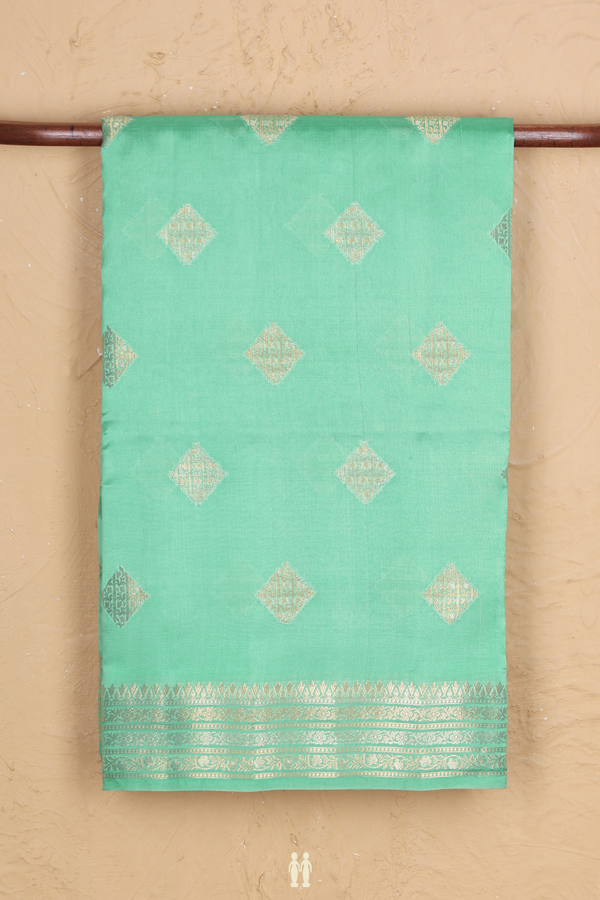 Raw Silk Saree In Green With Diamond Buttas