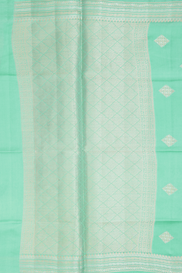Raw Silk Saree In Green With Diamond Buttas
