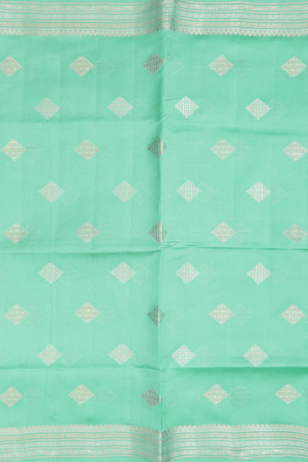 Raw Silk Saree In Green With Diamond Buttas