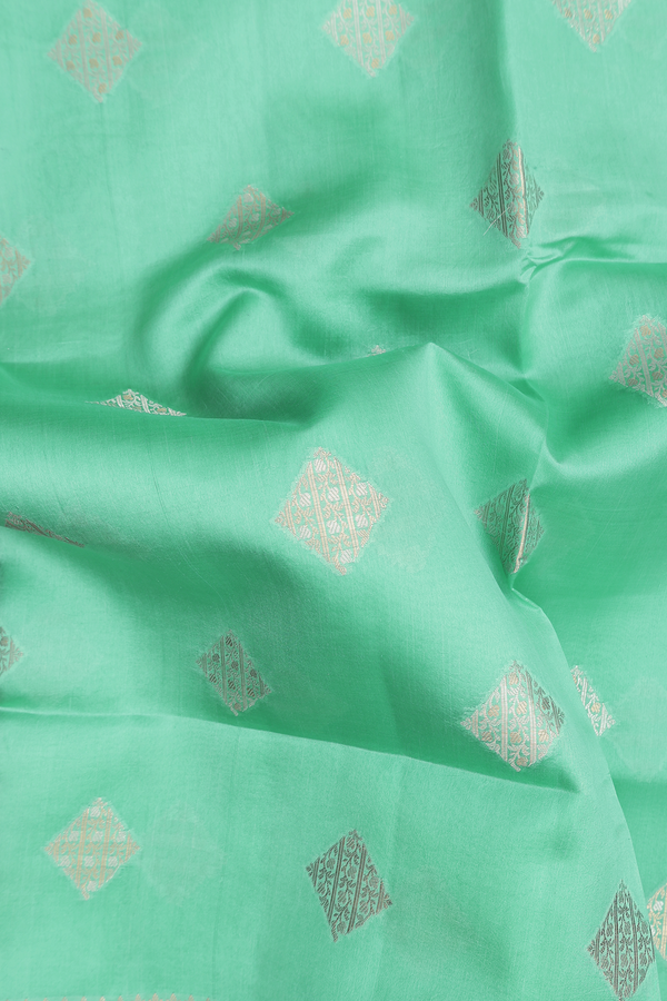 Raw Silk Saree In Green With Diamond Buttas