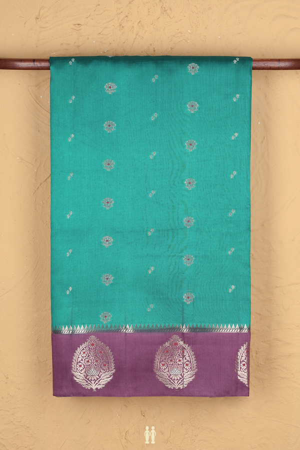 Raw Silk Saree In Peacock Green With Floral Buttas