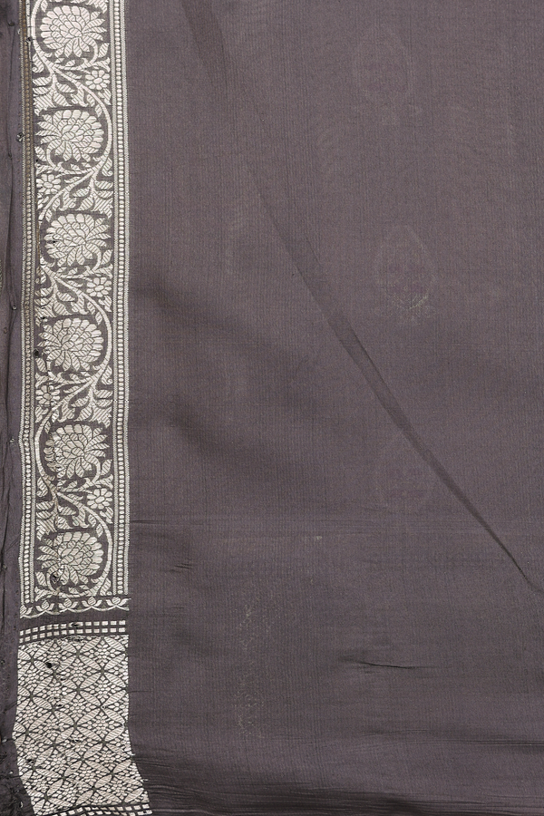 Raw Silk Saree In Brownish Grey With Floral Buttas