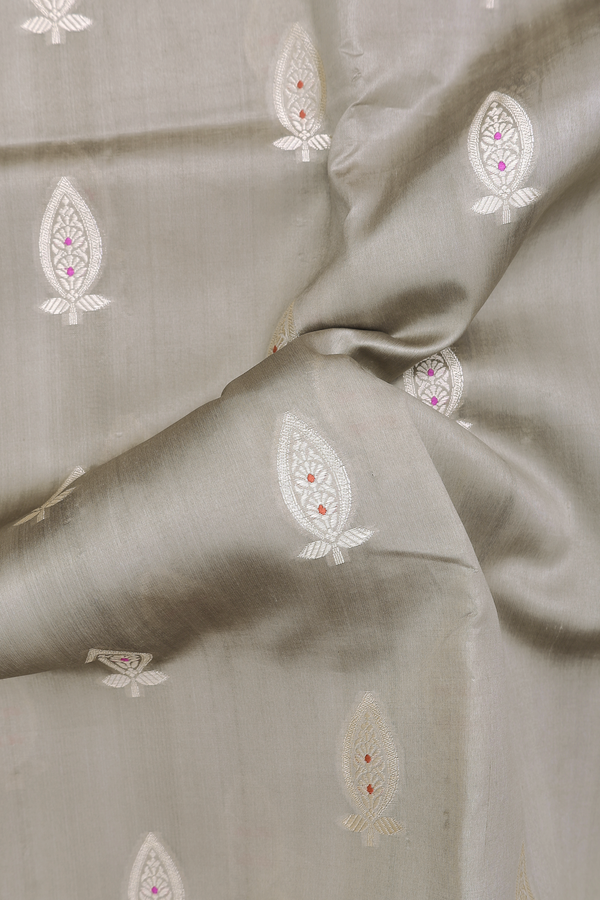 Raw Silk Saree In Brownish Grey With Floral Buttas