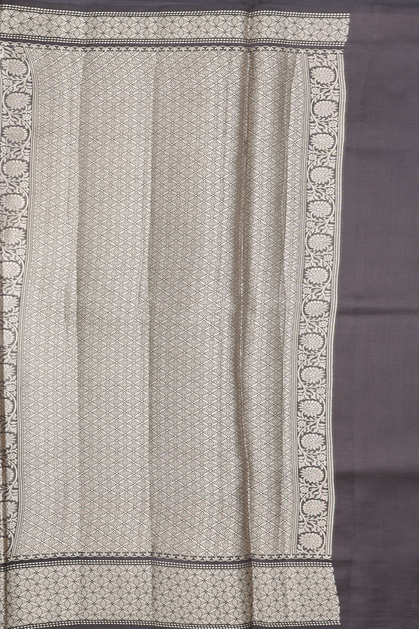 Raw Silk Saree In Brownish Grey With Floral Buttas