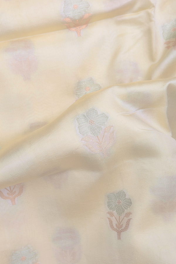 Raw Silk Saree In White With Floral Buttas
