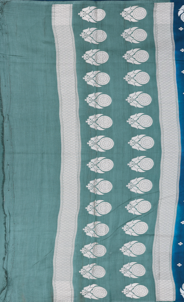 Raw Silk Saree In Midnight Green With Floral Buttas