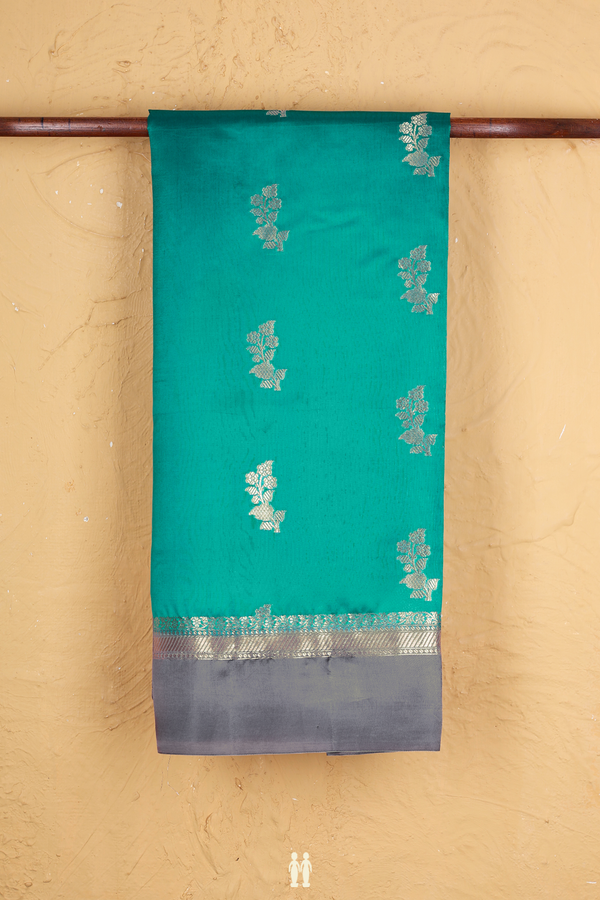 Raw Silk Saree In Sea Green With Floral Buttas