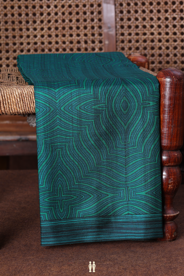 Printed Silk Saree In Green And Blue With Allover Design