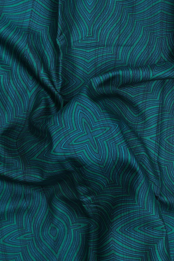 Printed Silk Saree In Green And Blue With Allover Design