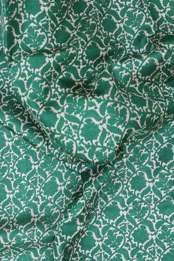 Printed Silk Saree In Cream Color With Floral Design
