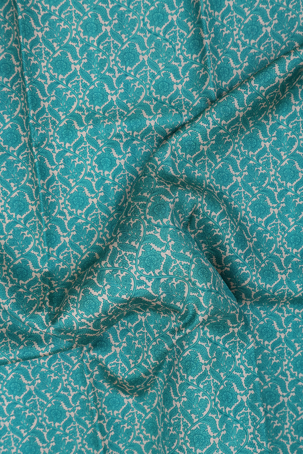 Printed Silk Saree In Green And Cream With Floral Design
