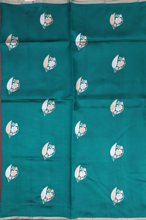 Raw Silk Saree In Peacock Green With Floral Motifs