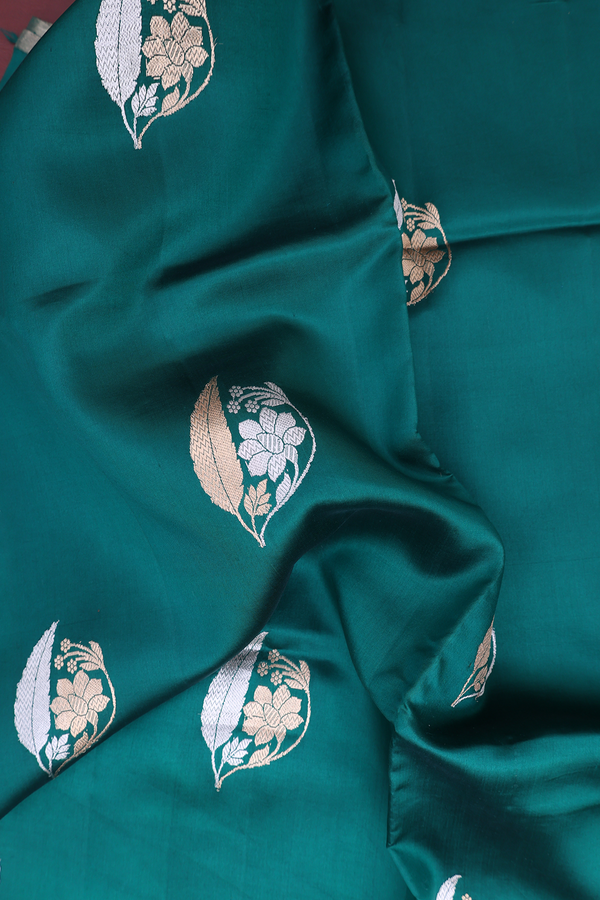 Raw Silk Saree In Peacock Green With Floral Motifs