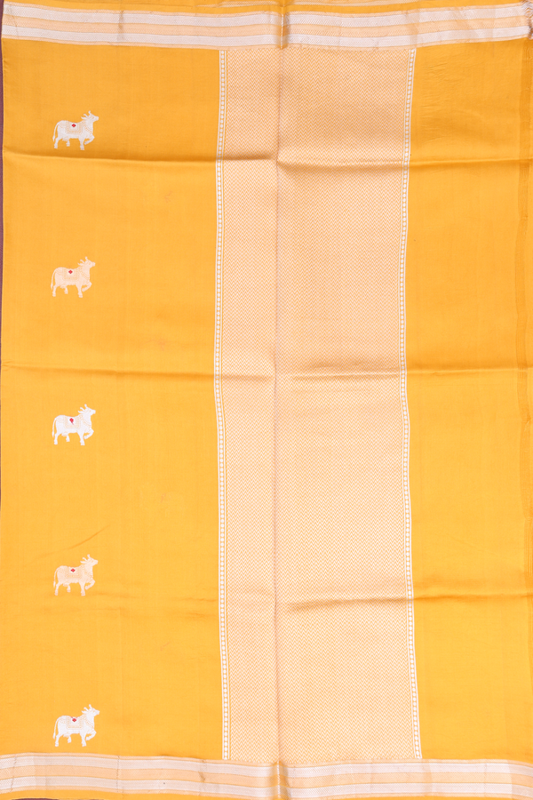 Raw Silk Saree In Saffron Yellow With Cow Buttas