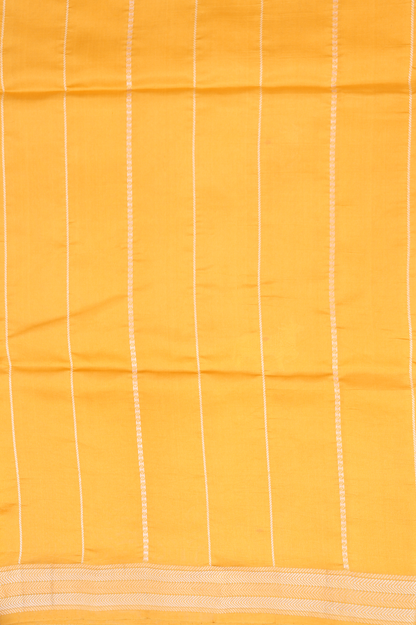 Raw Silk Saree In Saffron Yellow With Cow Buttas