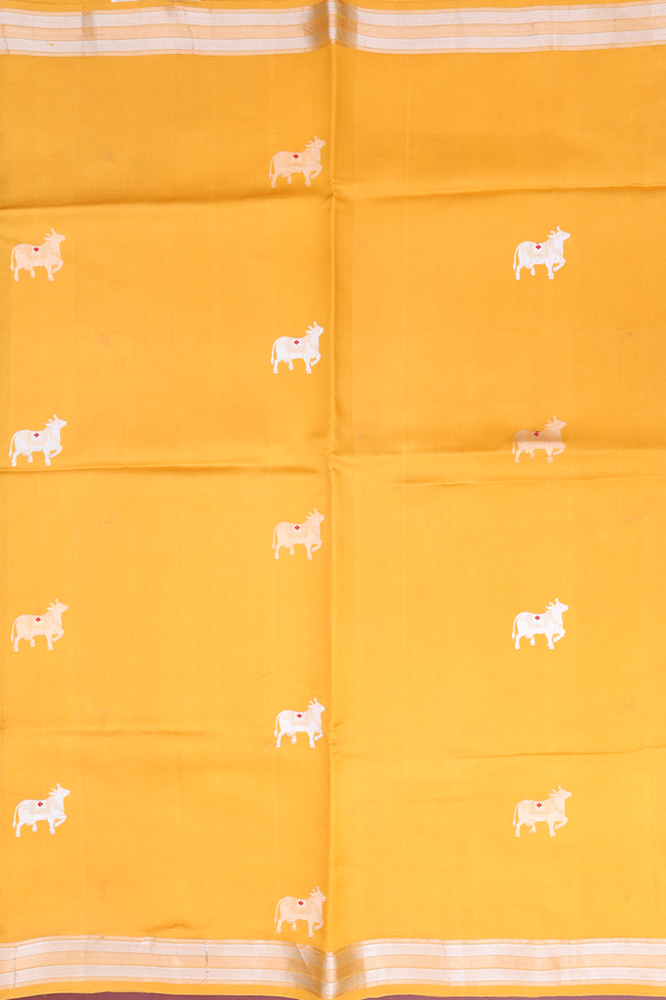 Raw Silk Saree In Saffron Yellow With Cow Buttas