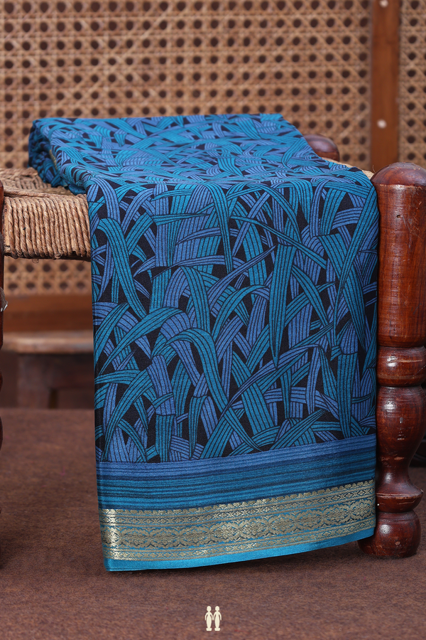 Crepe Saree In Black And Blue With Printed Design