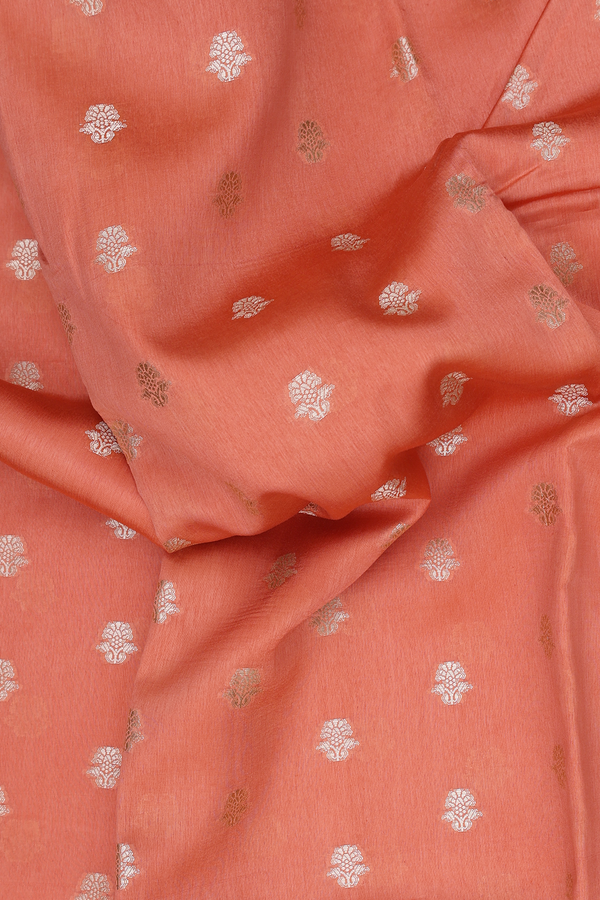 Raw Silk Saree In Light Orange With Floral Buttas
