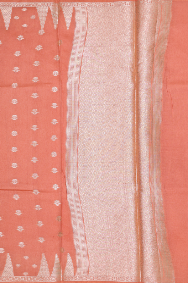 Raw Silk Saree In Light Orange With Floral Buttas