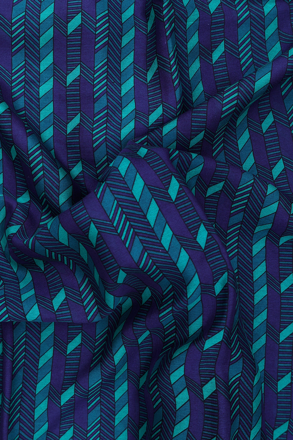 Crepe Saree In Green And Blue With Geometric Design
