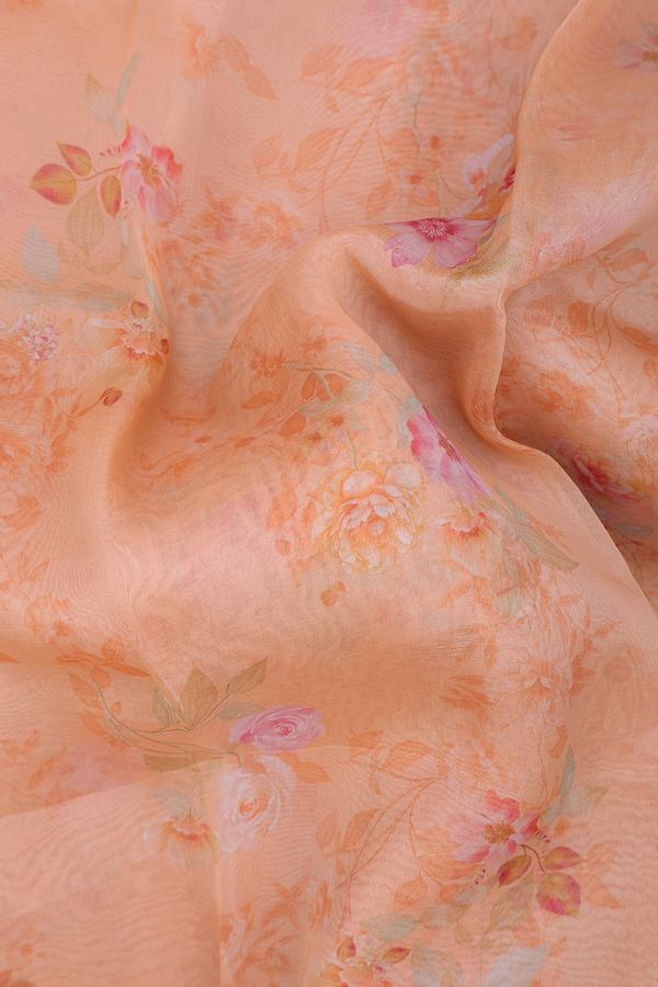 Organza Silk Saree In Light Orange With Floral Design