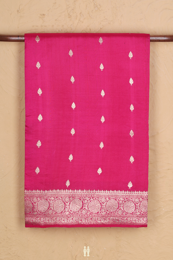 Raw Silk Saree In Rani Pink With Zari Buttas