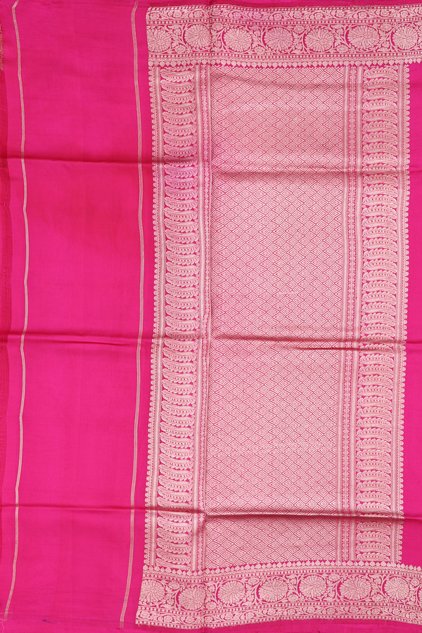 Raw Silk Saree In Rani Pink With Zari Buttas