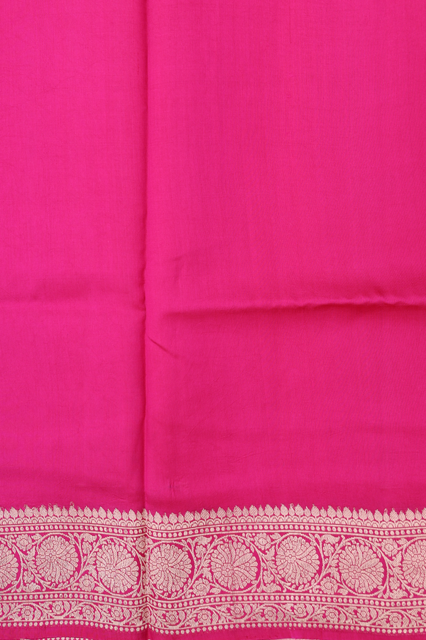 Raw Silk Saree In Rani Pink With Zari Buttas
