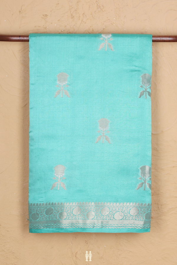 Raw Silk Saree In Tiffany Blue With Floral Buttas
