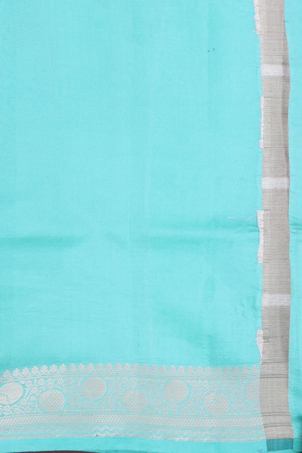 Raw Silk Saree In Tiffany Blue With Floral Buttas