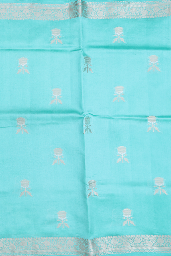Raw Silk Saree In Tiffany Blue With Floral Buttas