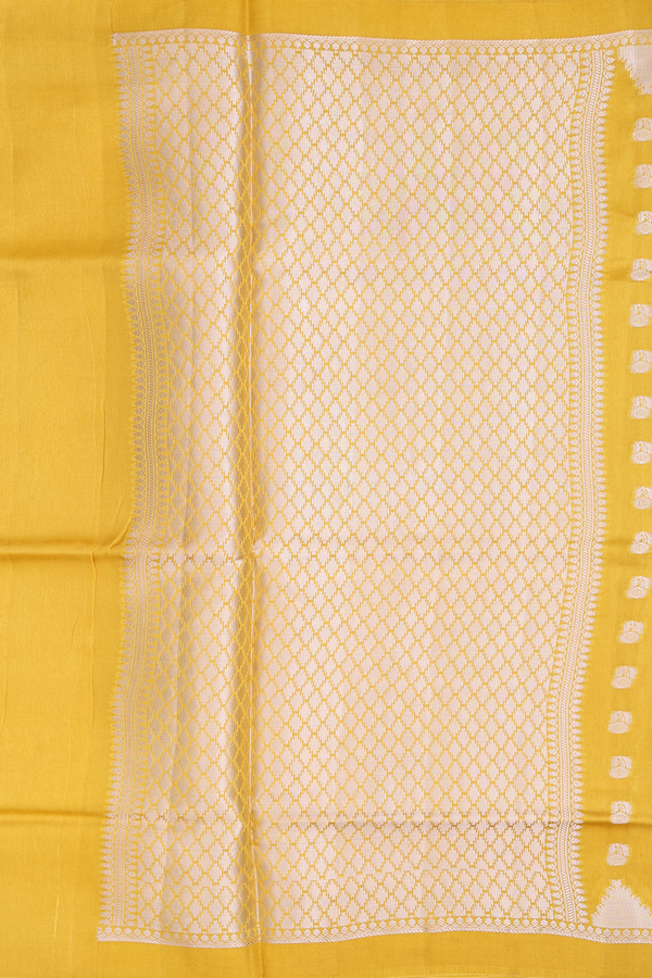 Raw Silk Saree In Yellow With Floral Buttas