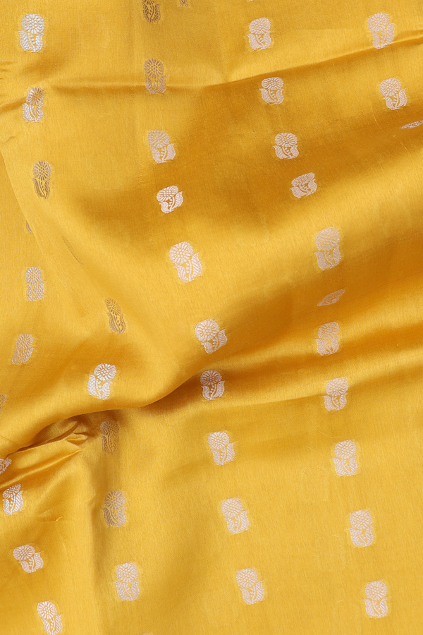 Raw Silk Saree In Yellow With Floral Buttas