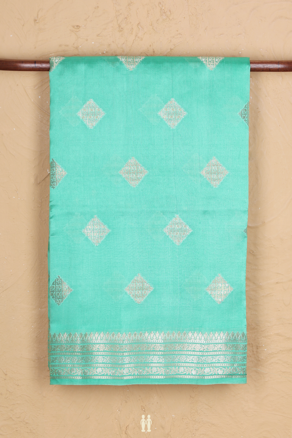 Raw Silk Saree In Green With Diamond Buttas