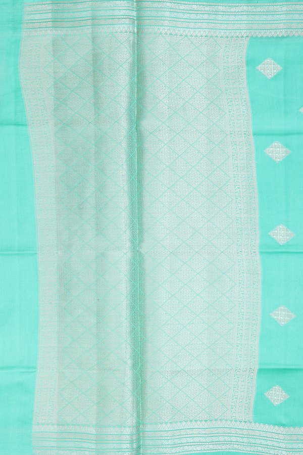 Raw Silk Saree In Green With Diamond Buttas