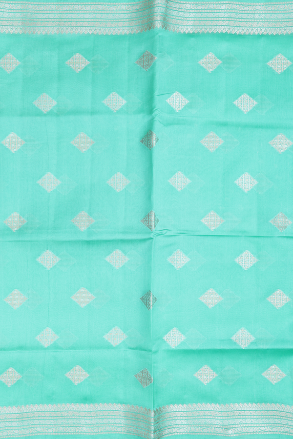 Raw Silk Saree In Green With Diamond Buttas