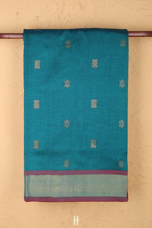 Semi Silk Cotton Saree In Green With Zari Buttas