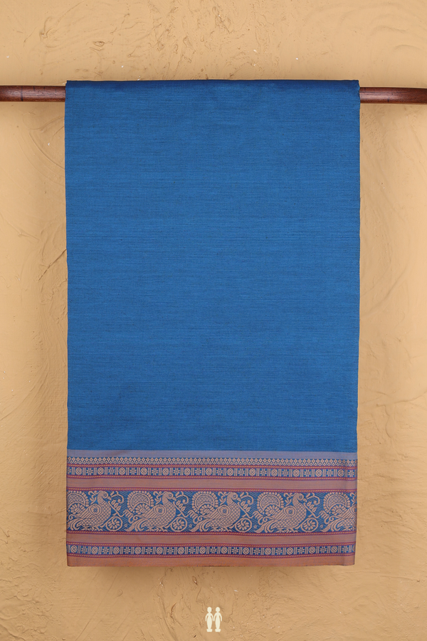 Semi Silk Cotton Saree In Blue With Peacock Border