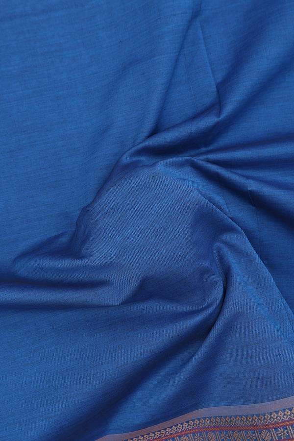 Semi Silk Cotton Saree In Blue With Peacock Border