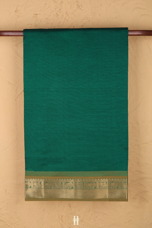 Semi Silk Cotton Saree In Emerald Green With Peacock Border